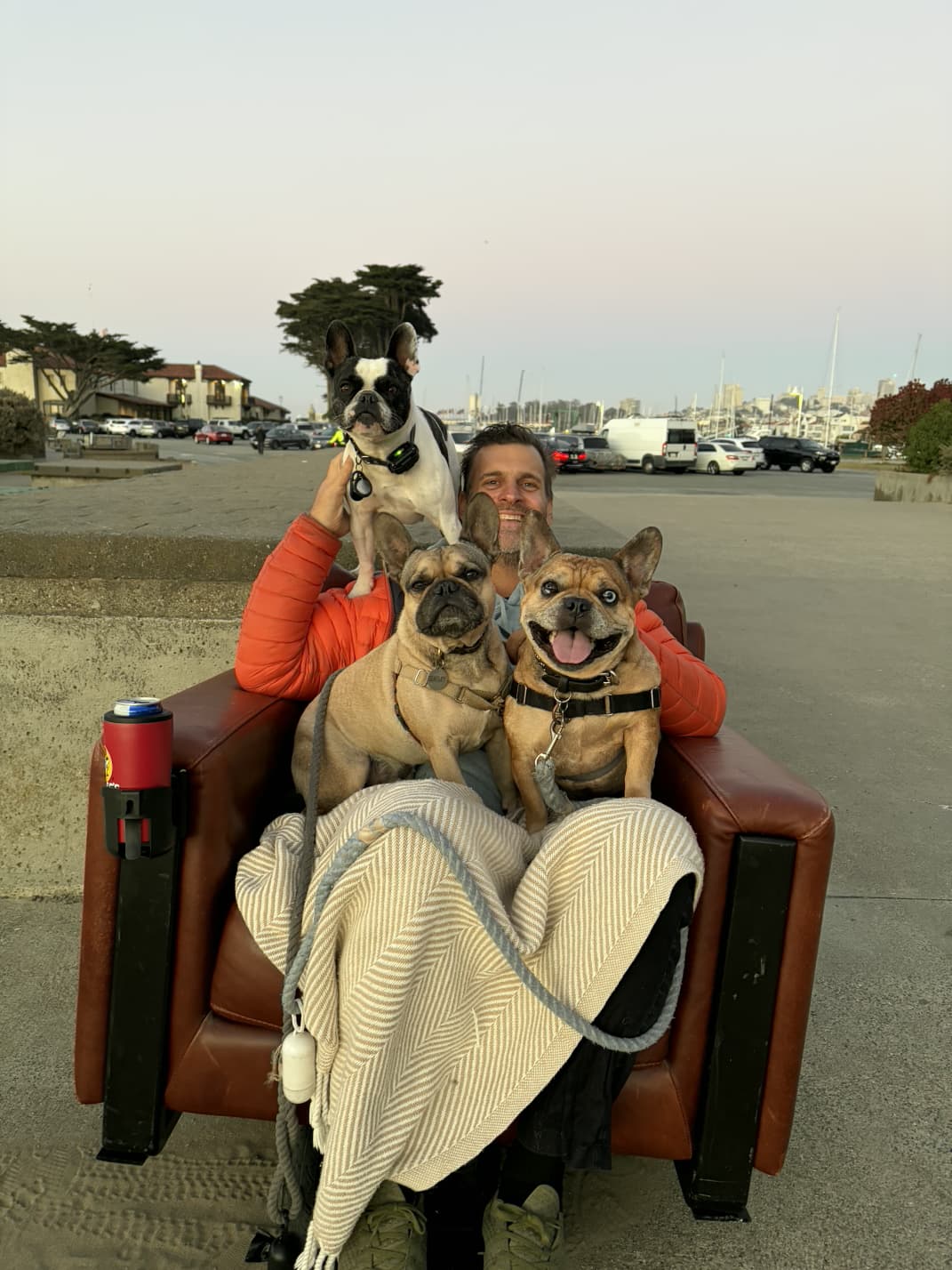 Kevin Graehl with his three French Bulldogs